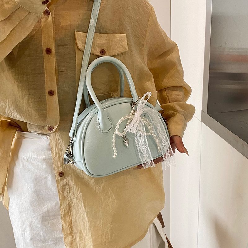 Korean Handheld Bowling for Women 2025 New Trendy Fashion Shell Niche Versatile Crossbody Bag