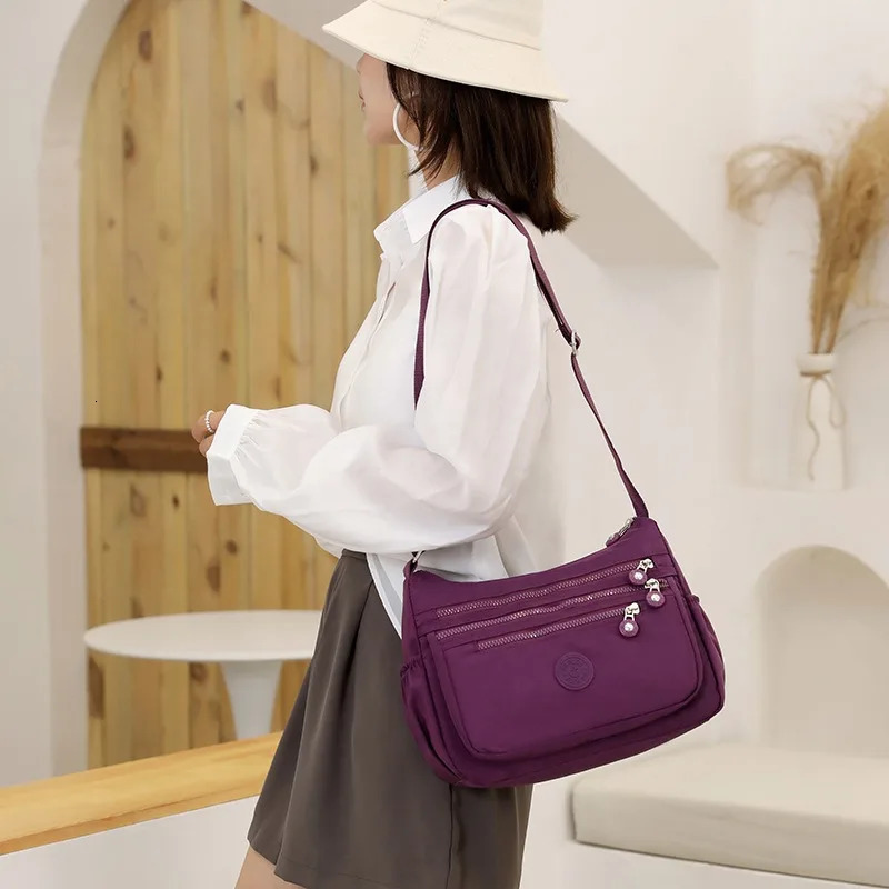 Multilayer shoulder messenger bag light cloth backpack Oxford womens canvas large capacity mother wa 260317