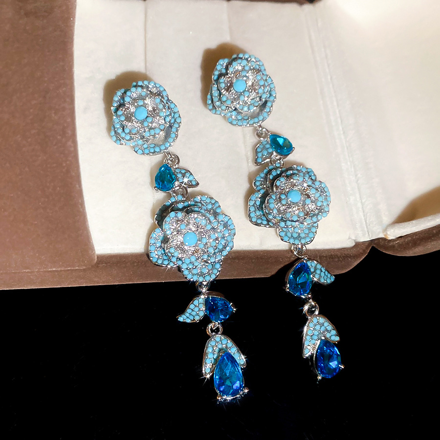 Vintage silver needle zircon hollow flower stud earrings with unique, exquisite, stunning design, offering a niche and high-end feel - view 6