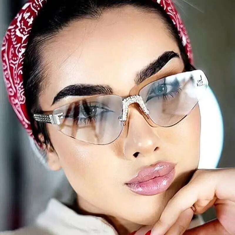 New Fashion Frameless For Women With Hollow Metal Sunglasses Cat Glasses 90259 26Y0330