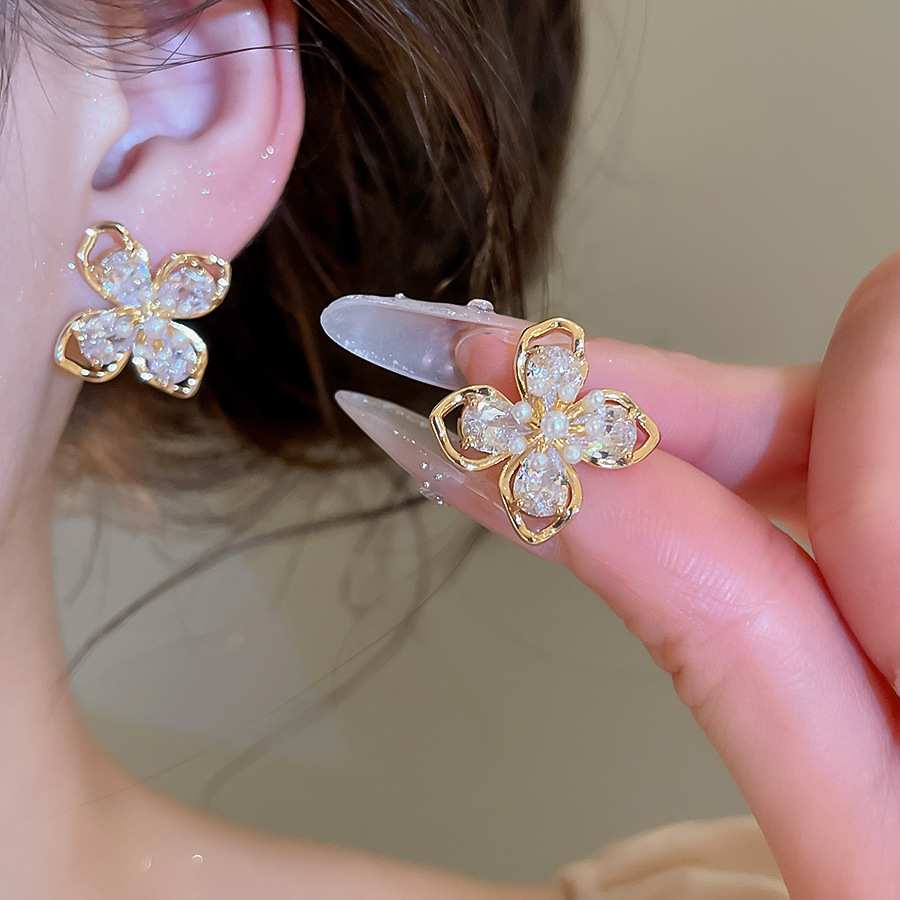Elegant Four Leaf Hollow Flower Earrings - Niche Style Jewelry for Women - view 3