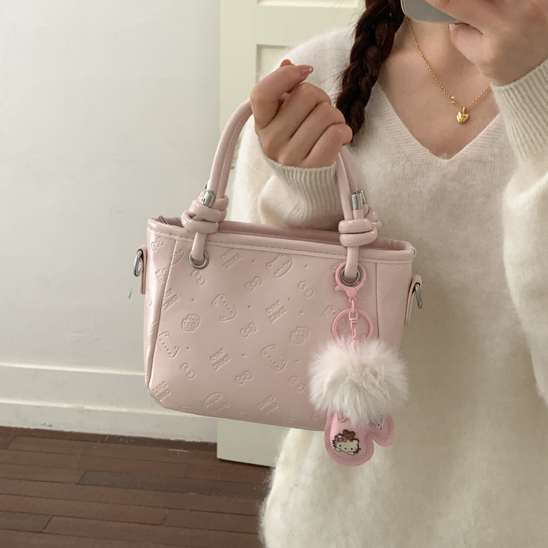 Cute embossed dopamine-colored textured handbag female office workers, versatile shoulder for class, high-end crossbody bag