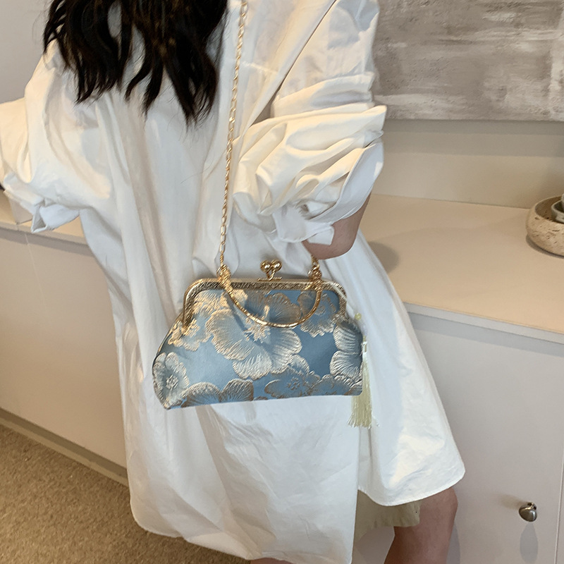 Luxury Brand Fashion Bag New Chinese-style Textured Wrap-around Handbag With Chinese Patterns. It Has High-end Texture And Charm, Suitable For Formal 