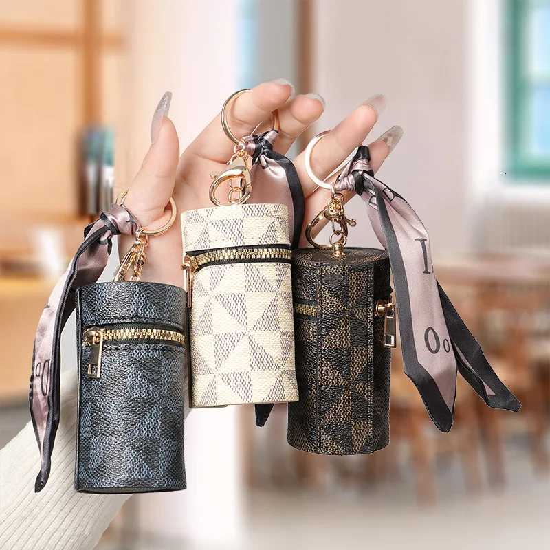 Womens Bag Pendants Versatile Fashionable Classic Bag Charms Multifunctional Coin Purses Headphones Lipstick Mini Storage Bags Z260330