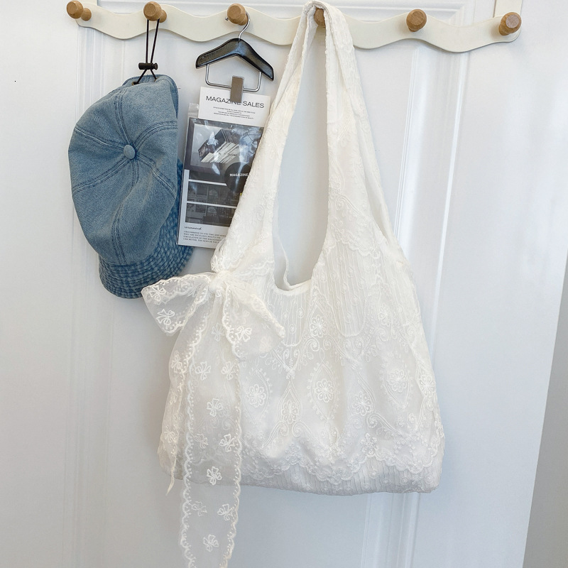Free Shipping High Value Lace Embroidery Shoulder Bag for Women Cute Bowknot Tote Bag Casual Beach Handbag