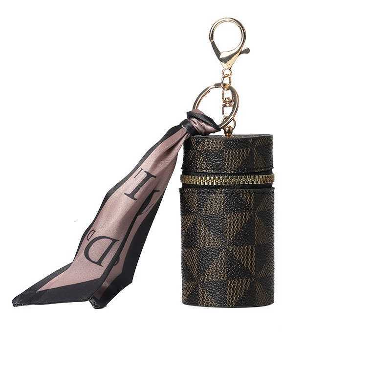 Womens Bag Pendants Versatile Fashionable Classic Bag Charms Multifunctional Coin Purses Headphones Lipstick Mini Storage Bags Z260330