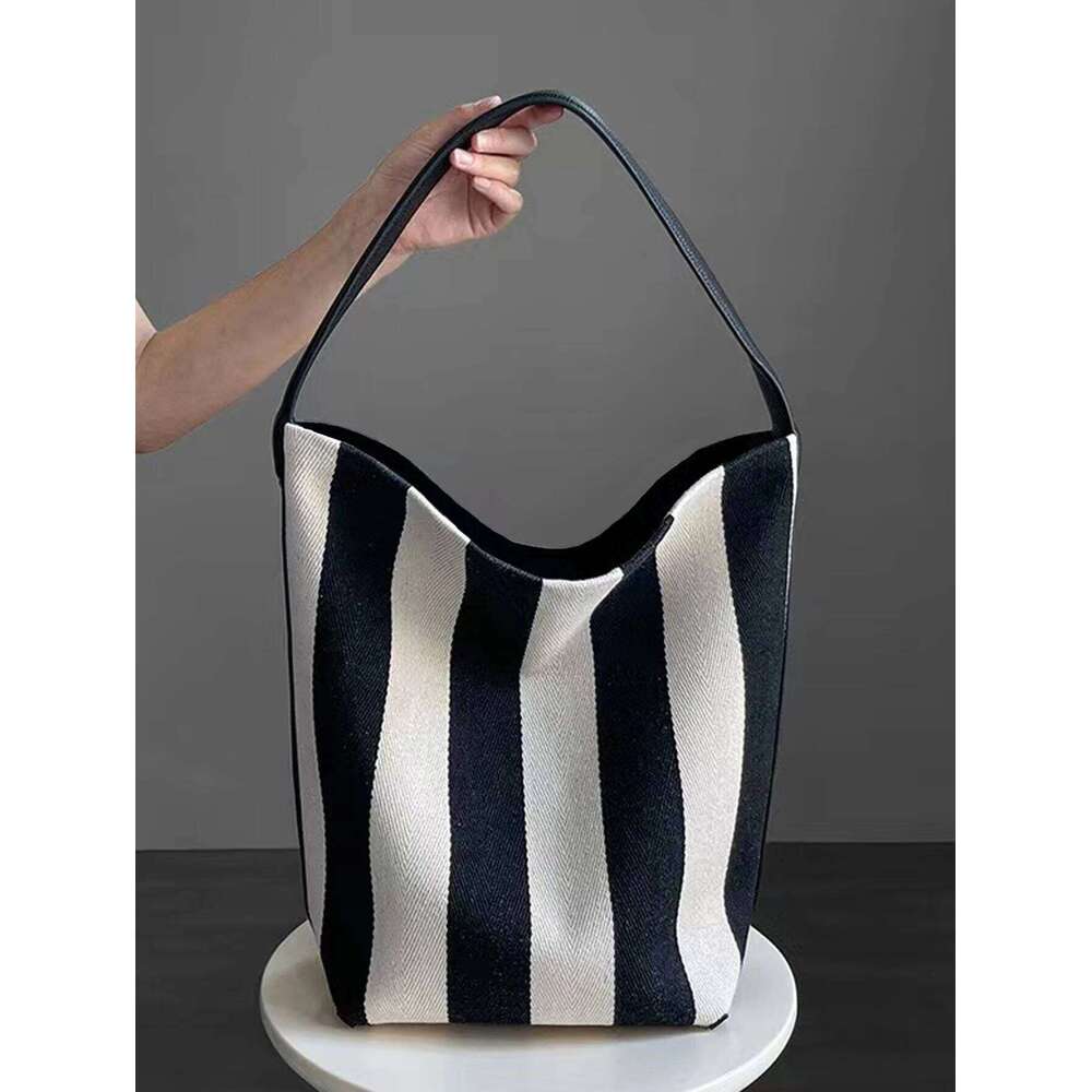 Niche Striped Canvas Bucket For Women Capacity Lazy Style Commuting Tote Bag New Single Shoulder Large Bag Trend XIU LAI SI