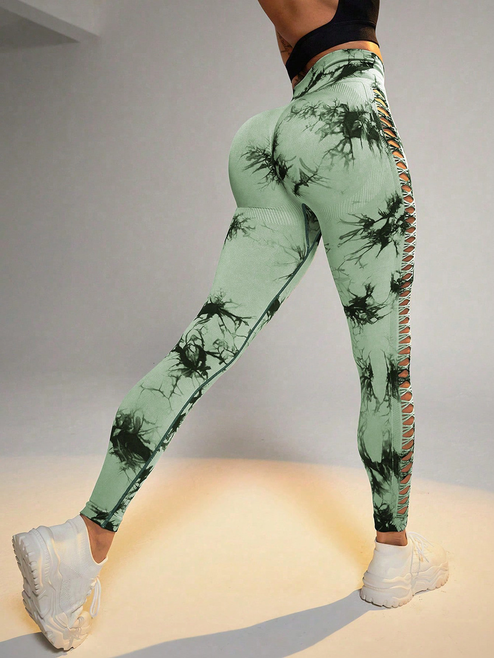Hollow-out yoga pants, high-waisted peach butt-lifting sports fitness pants, breathable tie-dye seamless yoga wear for women
