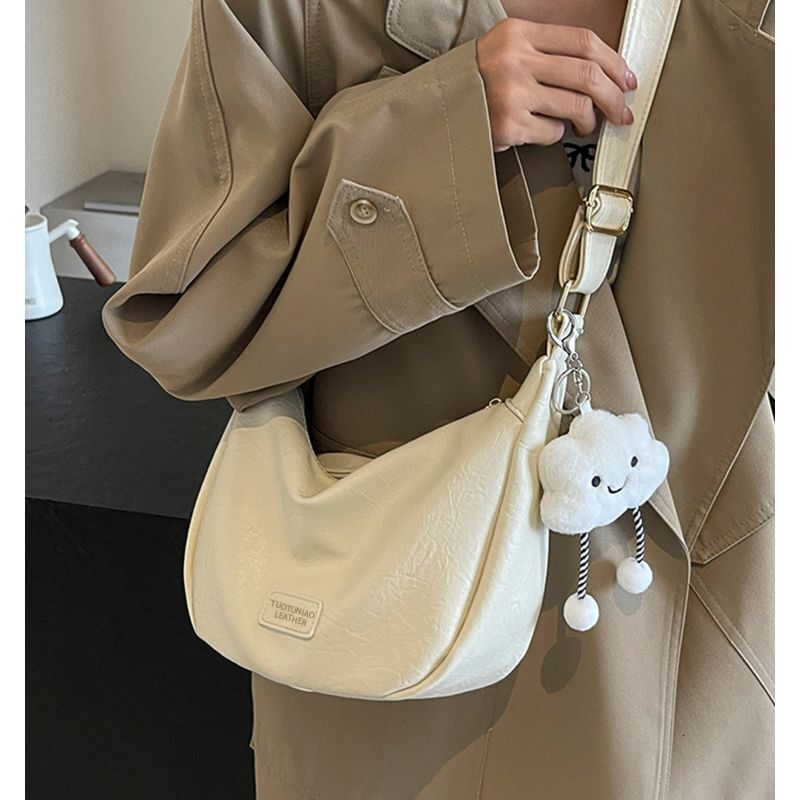 Large Capacity Dumpling for Women 2025 New Wide Strap Soft Leather Crossbody Versatile Commuter Casual Crescent Bag