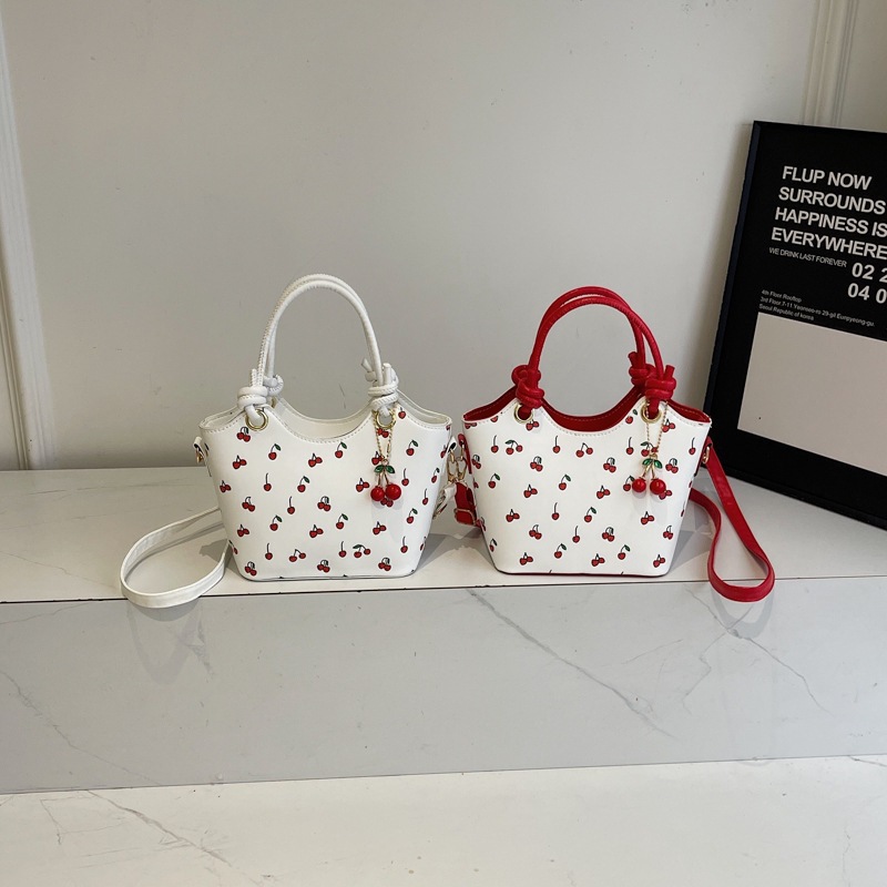 New Fashion Commuting Cute Pendant Large Capacity Printed Texture One Shoulder Underarm Handbag Bag 2026s hot