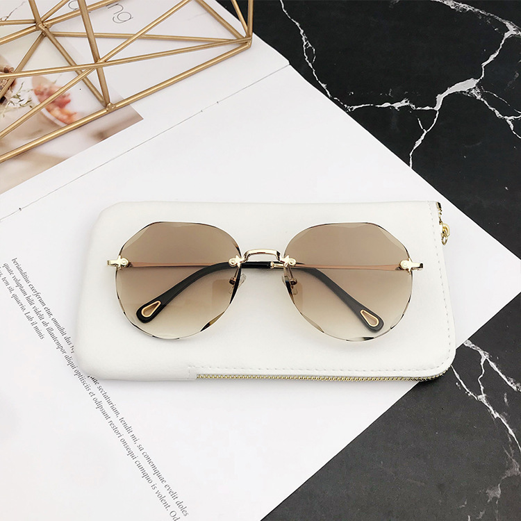 Fashionable Frameless Women's Designer Sunglasses Luxury Accessories Internet Famous Street Photography Large Frame Outdoor Sun Protection Cyclin