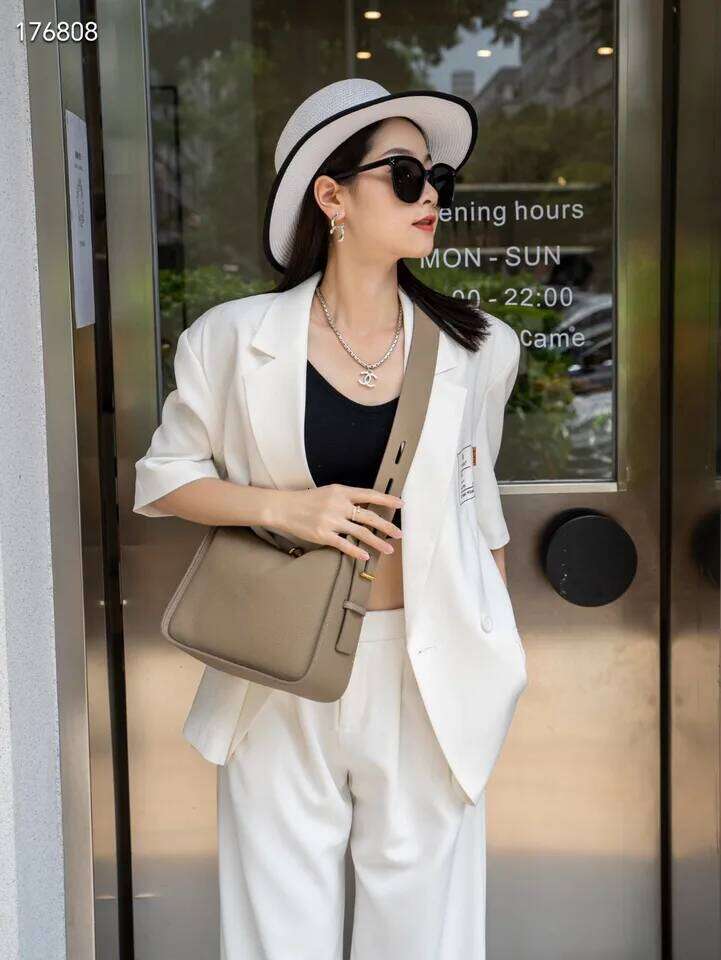 New Niche Luxury Crossbody Armpit Head Layer Cowhide Leather Ladies Wide Shoulder Strap Large Capacity Bag XIU LAI SI