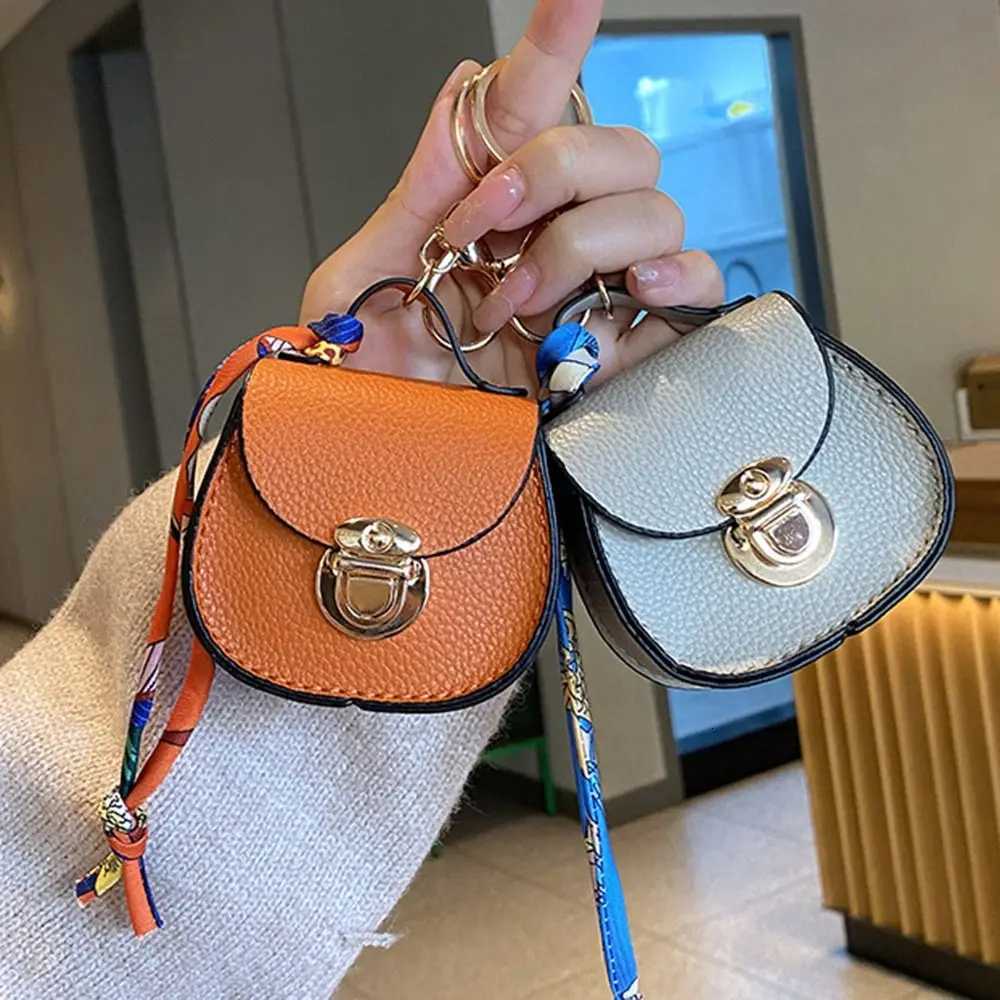 2026 NEW Fashion Keychain Small Coin Purse Premium Leather Multifunction Mini Storage Pouch Earphone Bag for Women Z260330