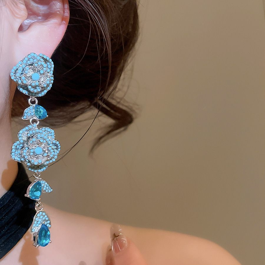 Vintage silver needle zircon hollow flower stud earrings with unique, exquisite, stunning design, offering a niche and high-end feel - view 3