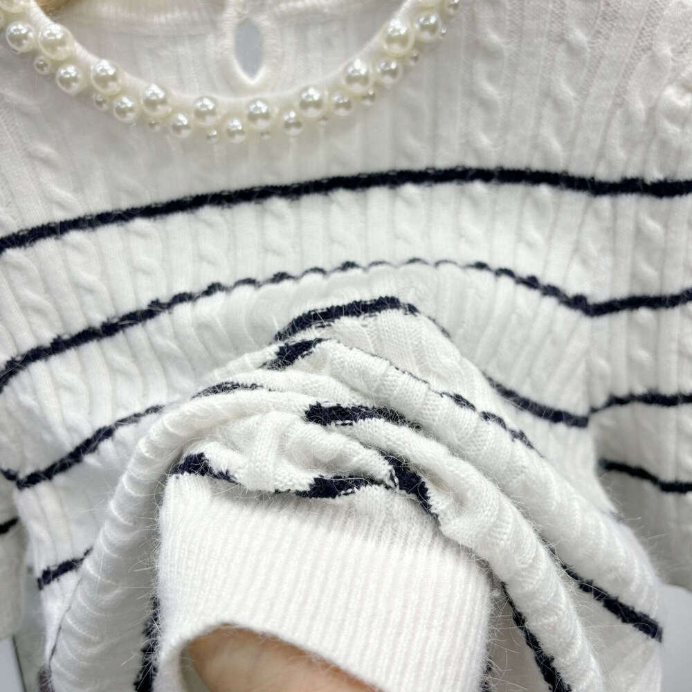 2026 autumn and winter new designer women's French retro striped wool sweater pearl round neck D17 short sleeved pullover
