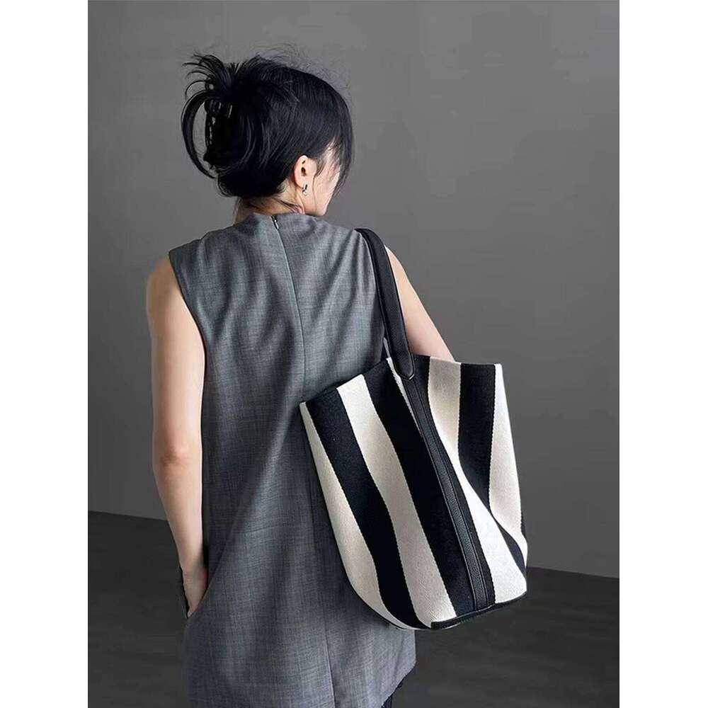 Niche Striped Canvas Bucket For Women Capacity Lazy Style Commuting Tote Bag New Single Shoulder Large Bag Trend XIU LAI SI