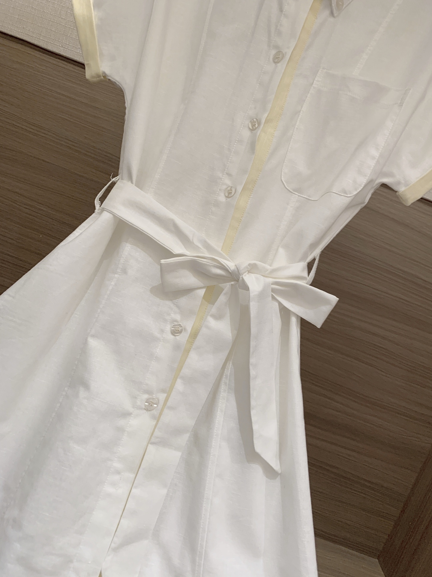 Chic Shenzhen Nan'ou Minimalist Embellished Neckline Flap Hem Unbuttoned Women's Top