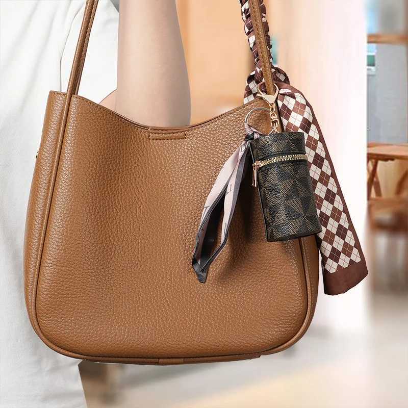 Womens Bag Pendants Versatile Fashionable Classic Bag Charms Multifunctional Coin Purses Headphones Lipstick Mini Storage Bags Z260330