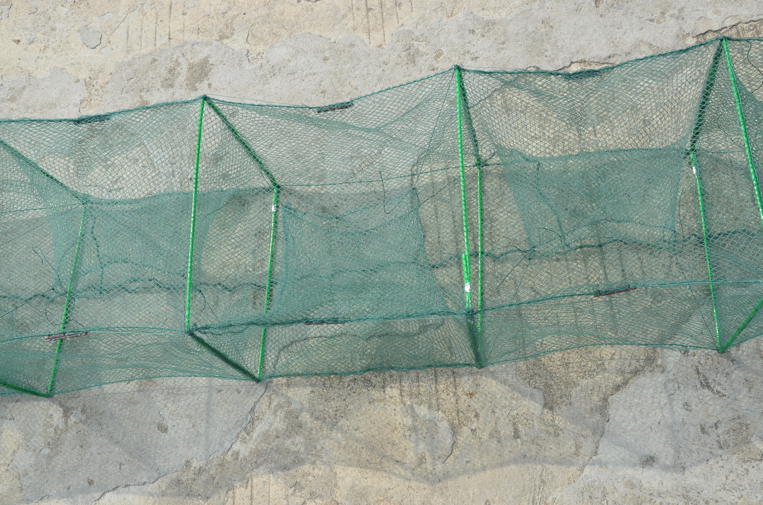 fishing fishnet fishing cast net fish cageEco-Friendly Fish Gathering Equipment: Robust Meshed Nets with Easy Retrieval