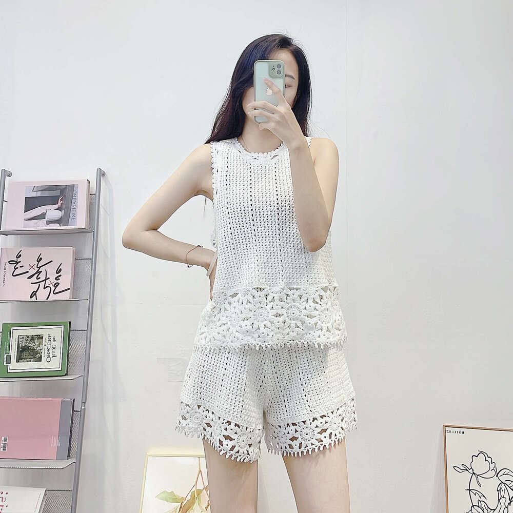 Cross-border clothing summer new French fashion k30 hollow crochet age-reducing knit women's tank top + shorts two-piece set
