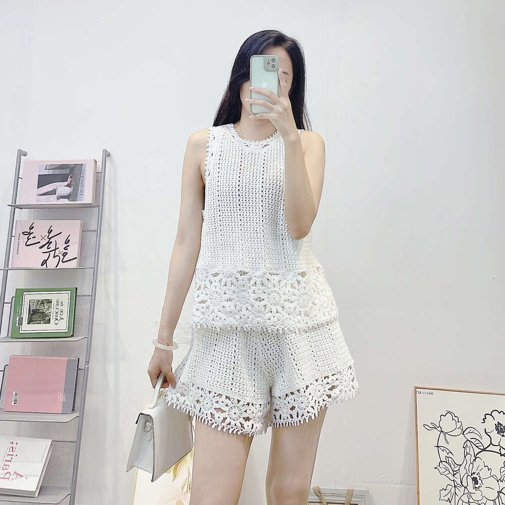 Cross-border clothing summer new French fashion k30 hollow crochet age-reducing knit women's tank top + shorts two-piece set