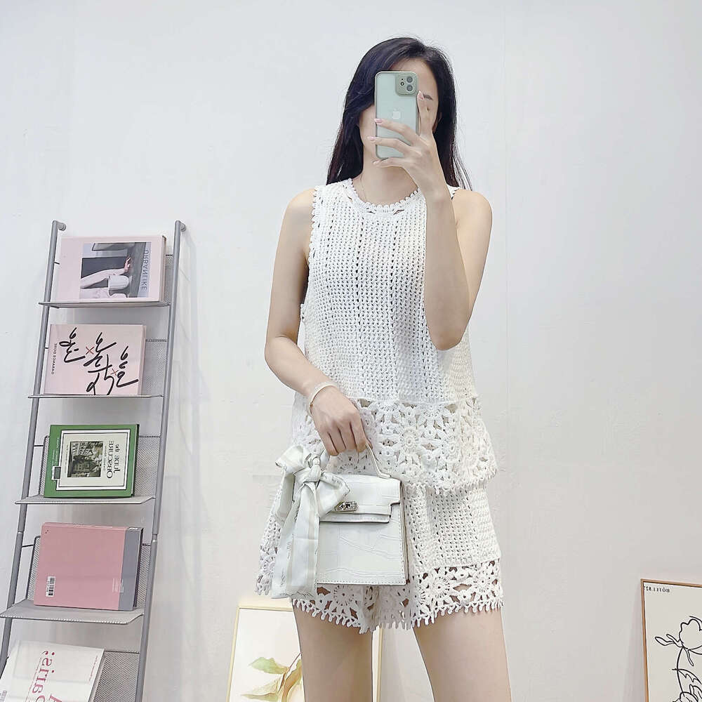 Cross-border clothing summer new French fashion k30 hollow crochet age-reducing knit women's tank top + shorts two-piece set