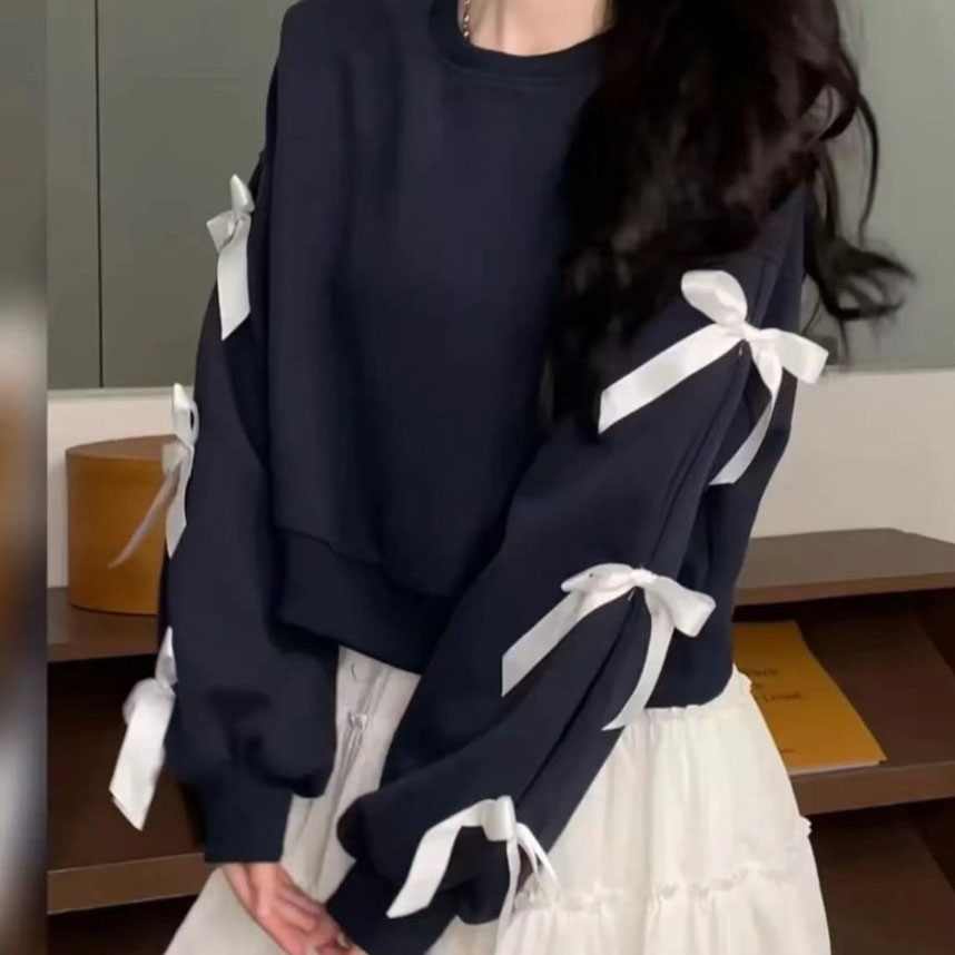 2026 Plus-size and slightly chubby ladies' stylish and slimming sweatshirt with a bowknot design exuding elegance This long-sleeved pullover top 