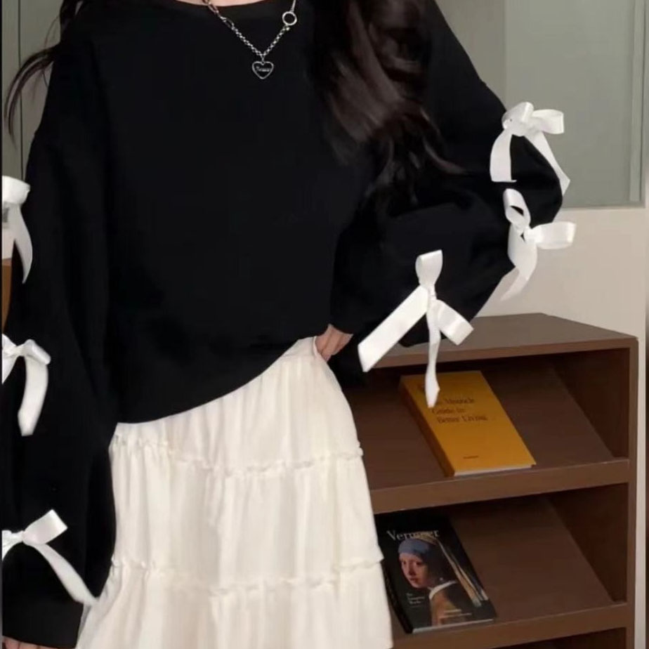2026 Plus-size and slightly chubby ladies' stylish and slimming sweatshirt with a bowknot design exuding elegance This long-sleeved pullover top 