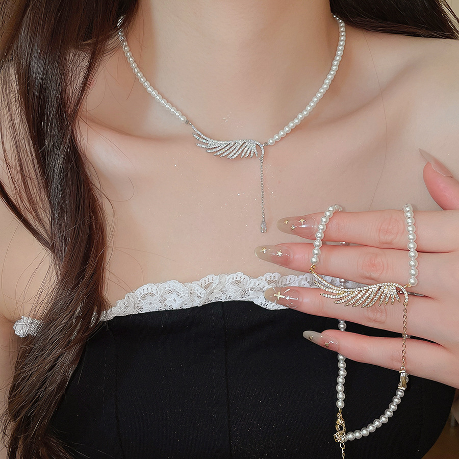 Zircon pearl beaded wing and water drop pendant necklace, new fashion versatile collarbone chain, light luxury high-end accessory - view 3