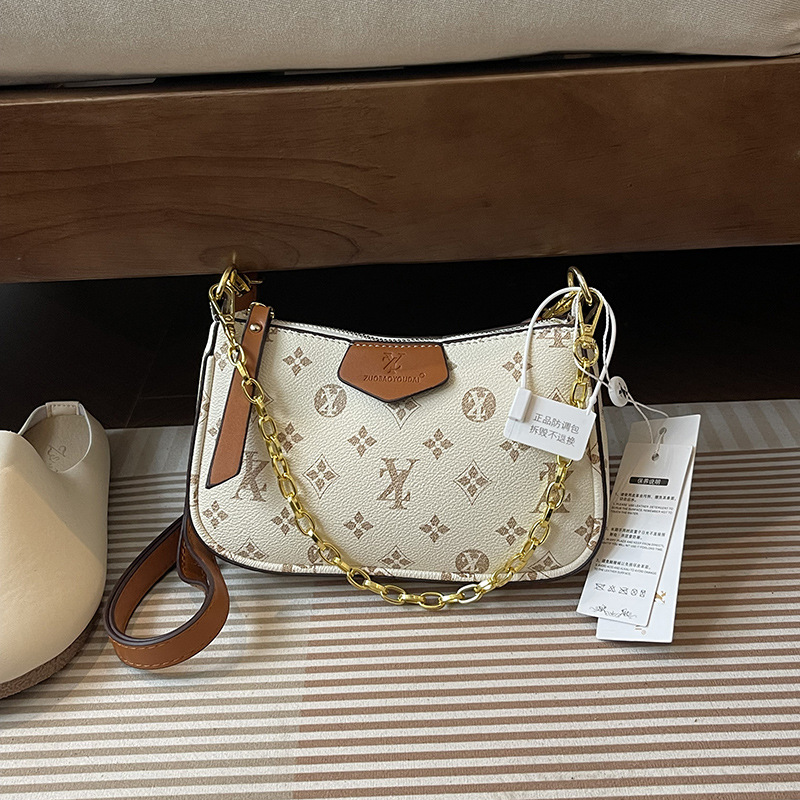 designer luxury Small handbag for women 2026 new high-end niche design popular on Instagram versatile wide strap crossbody bag Neat