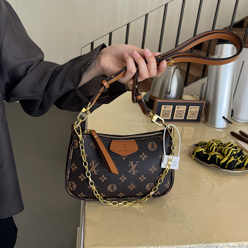 designer luxury Small handbag for women 2026 new high-end niche design popular on Instagram versatile wide strap crossbody bag Neat