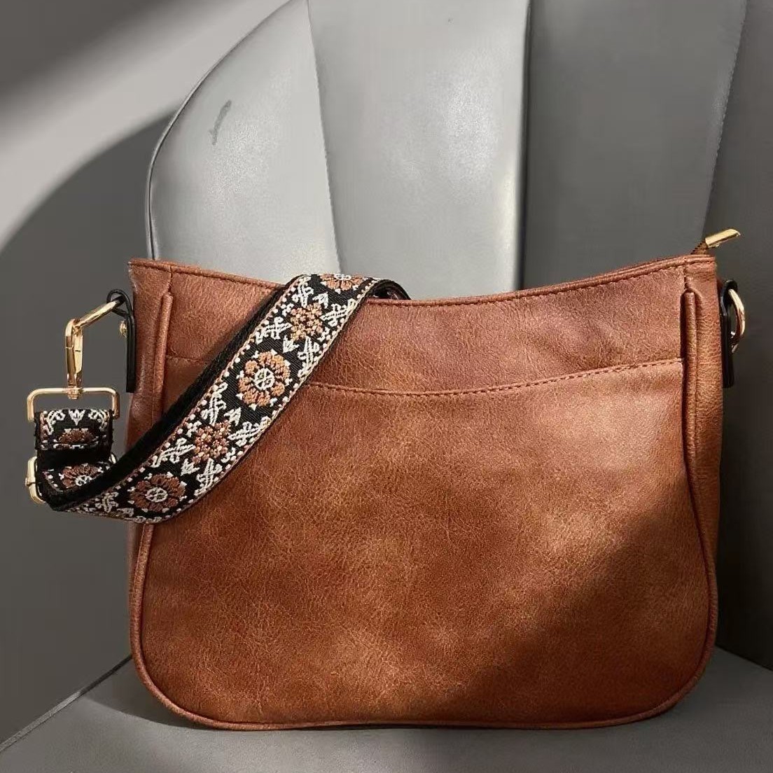 2026 New Retro Vegan Leather Crossbody Bag Brown Casual Hobo Purse with Bohemian Floral Wide Strap Wholesale