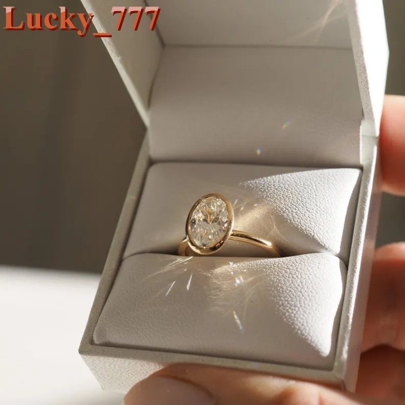 Womens Bezel Set 3ct Oval Shape Lab Grown Diamond Solitaire Engagement Ring VS Clarity D Color in 14K Yellow Gold