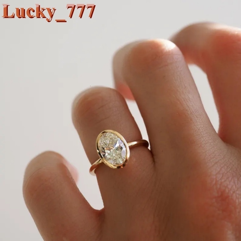 Womens Bezel Set 3ct Oval Shape Lab Grown Diamond Solitaire Engagement Ring VS Clarity D Color in 14K Yellow Gold