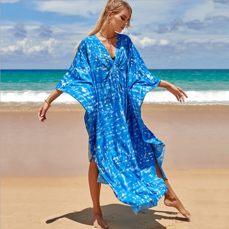 V-neck long sleeved dress with large hem bohemian floral print pleated decorative pocket dress 240827