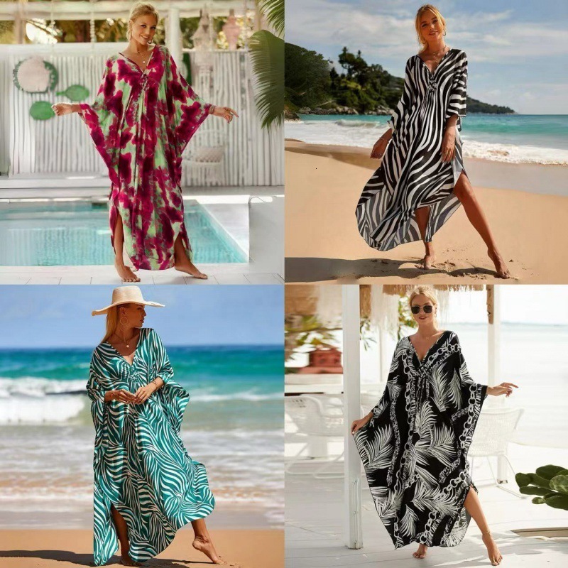 V-neck long sleeved dress with large hem bohemian floral print pleated decorative pocket dress 240827