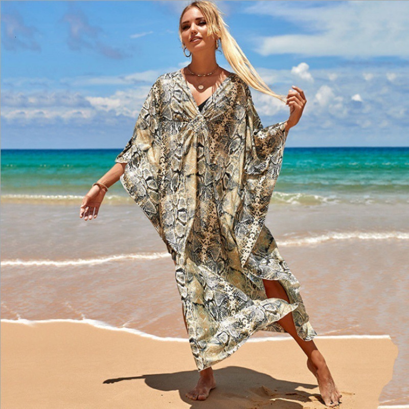 V-neck long sleeved dress with large hem bohemian floral print pleated decorative pocket dress 240827