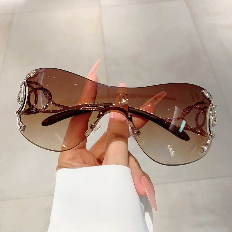Designer Sunglasses New Personalized Fashion Frameless Integrated Sunglasses Technology Y K Weird Sunglasses Riding Windproof Glasses