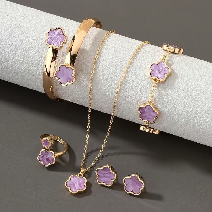 Designer Jewelry Best Selling Lucky Flower Jewelry Set Acrylic Bracelet Five Leaf Clover Necklace Ring And Earrings For Women Wholesale
