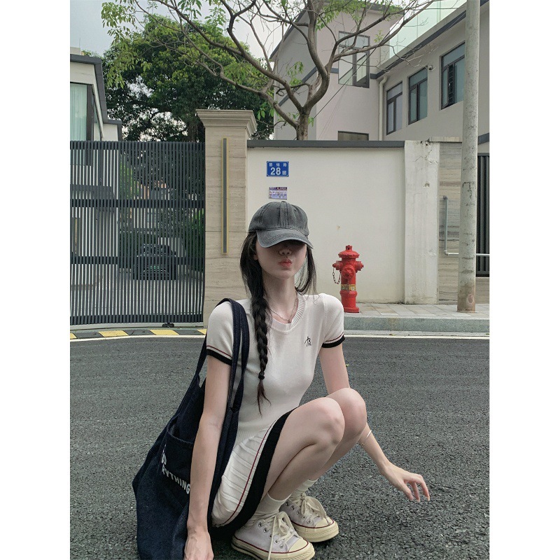 Designer T-shirt 2026 new fashionable short sleeved shirt with skirt Round neck short sleeve knitted top for women slim fit A line skirt two piece set