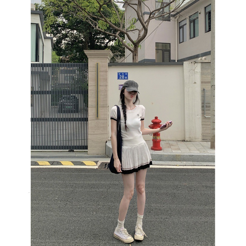 Designer T-shirt 2026 new fashionable short sleeved shirt with skirt Round neck short sleeve knitted top for women slim fit A line skirt two piece set