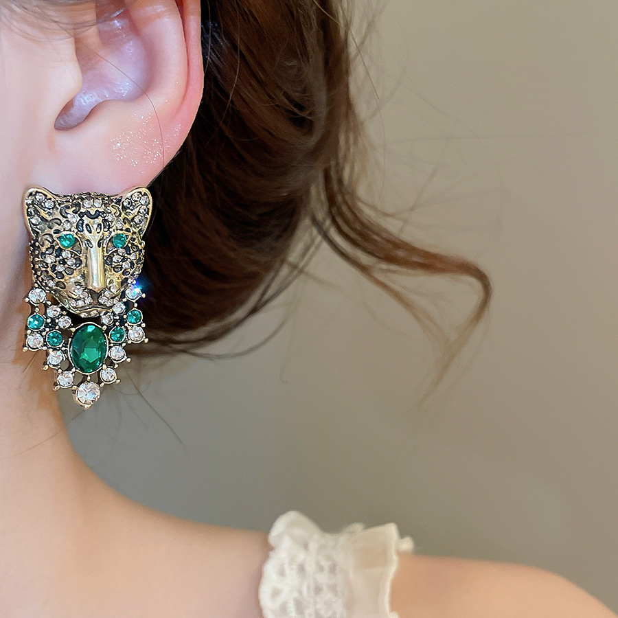Vintage diamond-studded green crystal gemstone leopard head earrings with a high-end retro and stylish vibe - view 3