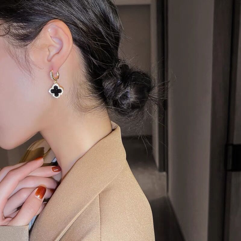 designer Four leaf Clover Earrings for Women Classic Style Earrings New Model Copper Gold plated Light Sparkling Zirconia Earrings