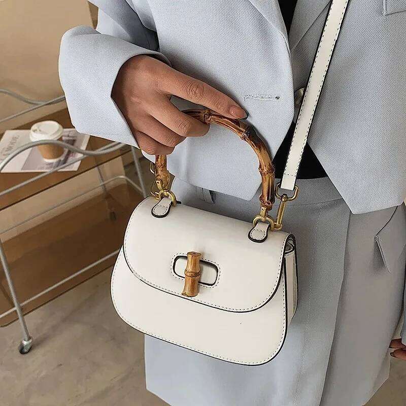 Chic Bamboo Handle Saddle For Women High End Single Shoulder Bags Fashionable Purses And Handbag Niche Designe Crossbody Bag QIBALIANGPIN