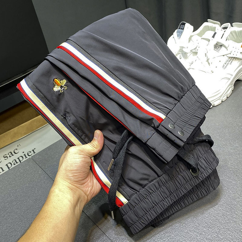 Luxury Brand Designer Men White Ice Silk Quick Dry Side Stripe Bee Embroidery Slim Fit Jogger Pants 2026 Summer Casual Athletic Versatile Daily Wear T