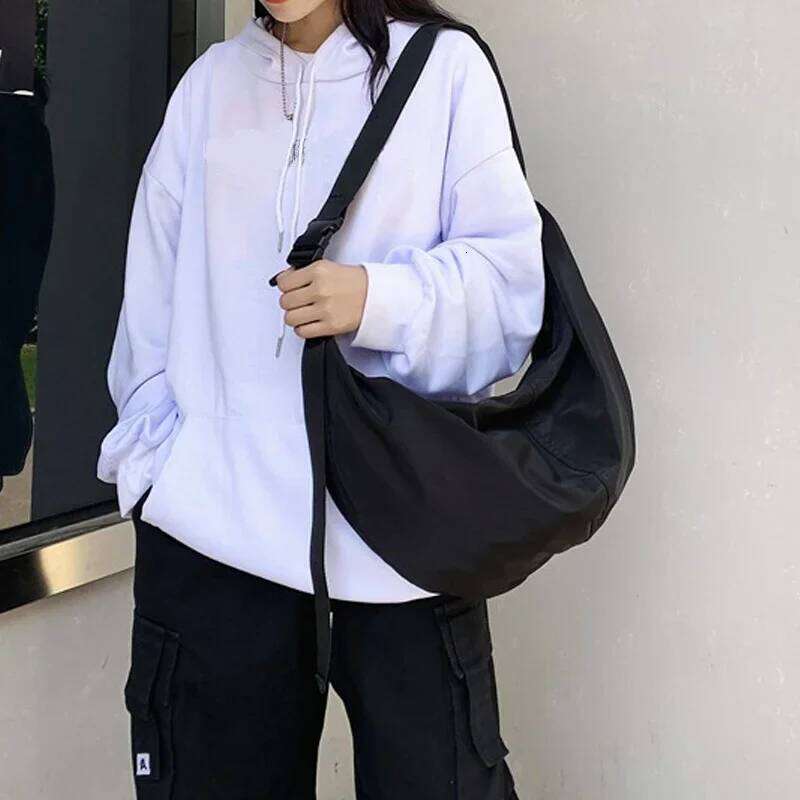 Oxford cloth dumpling for women, trendy and cool couple, lazy style crossbody large capacity student class shoulder bag