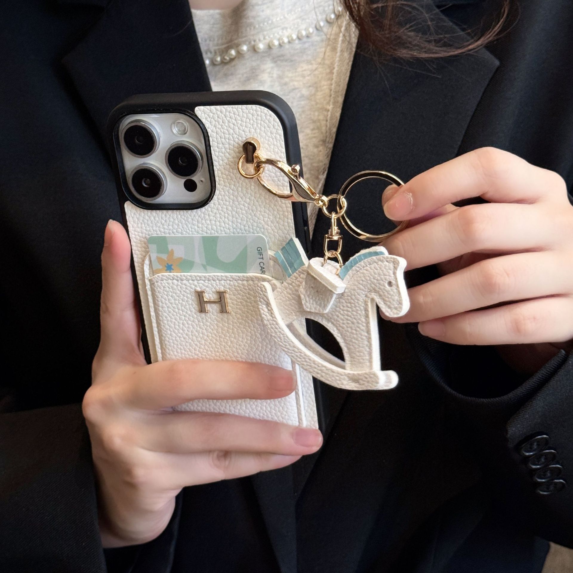 new card - inserting + rocking - horse iPhone 17 phone case with litchi - grain genuine leather feel