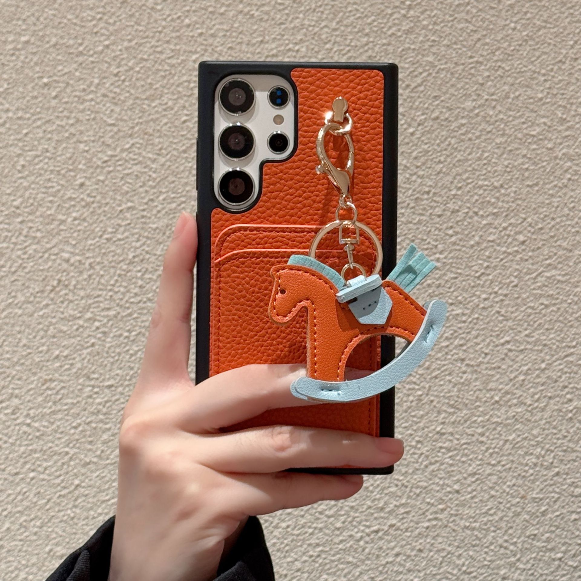 new card - inserting + rocking - horse iPhone 17 phone case with litchi - grain genuine leather feel