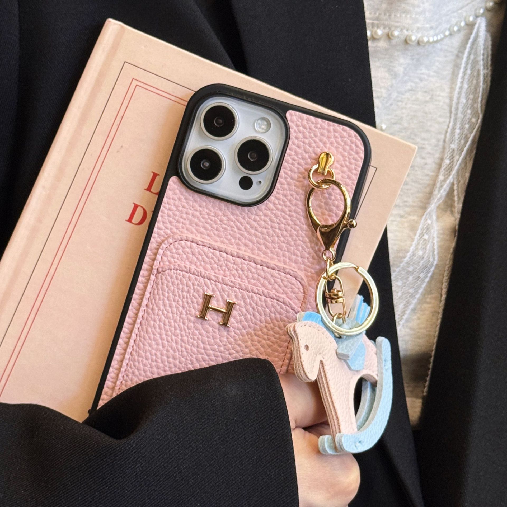 new card - inserting + rocking - horse iPhone 17 phone case with litchi - grain genuine leather feel