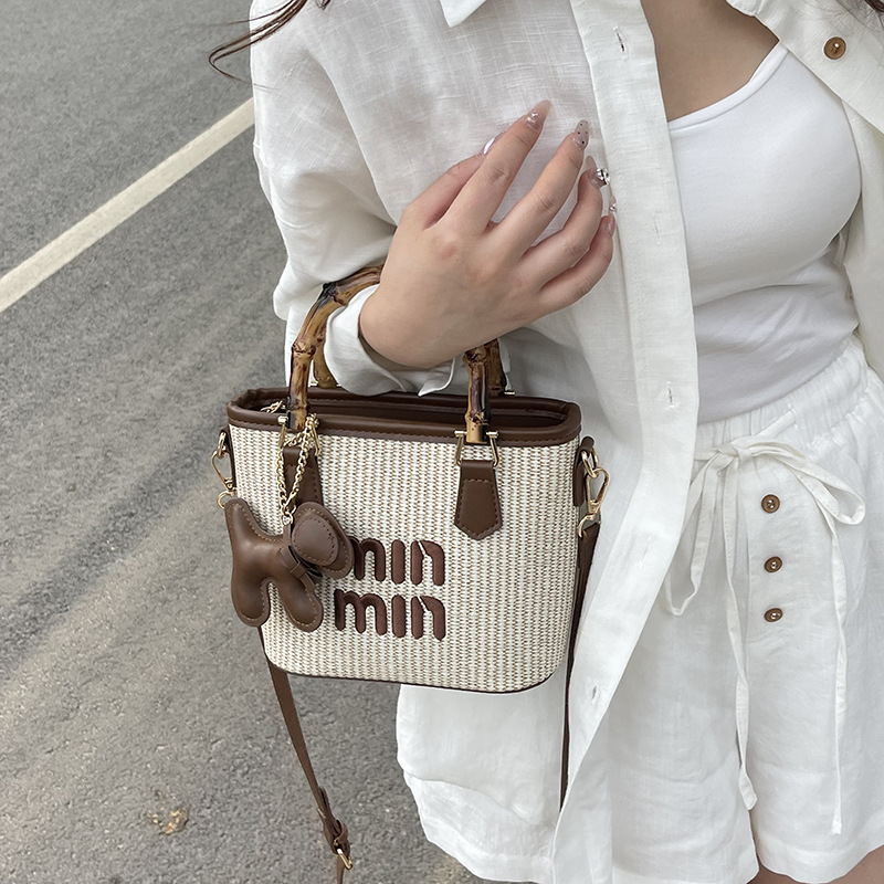 Woven small bag for women 2026 new summer casual seaside vacation crossbody hand-held bucket bag